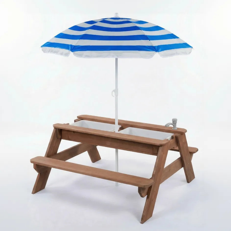 Wooden picnic table with a blue and white striped umbrella on a white background